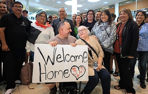Ruth Bonneville / Free Press
LOCAL - 60's scoop airport reunion
Photo of Jonathan Hooker with his biological mom. Patsy George, having a group shot taken with family and friends after they met for the1st time after many years at the airport Wednesday.
Jonathan Hooker, who was taken from his family in Northern Manitoba in the 1970s, arrives with his wife Charmaine Hooker (green vest) after travelling from their home in New Zealand to meet his biological mom, Patsy George and family at the James Richardson Winnipeg International Airport Wednesday.
Story info: He’s one of an estimated 30,000 Indigenous children taken from their homes during what has become known as the Sixties Scoop. A time period that spanned from 1951-1991. Jonathan was adopted by a white middle-class family in Manitoba, and they moved to New Zealand.
A big welcome party took place with Drummers and Indigenous leaders, family and friends to celebrate his return home. His birth mom, Patsy George with her sister, Flora McNabb (grey sweater), granddaughter Nellie McNabb (rust shirt) and many other family members and friends gather at the airport.
Aug 27th, 2025
