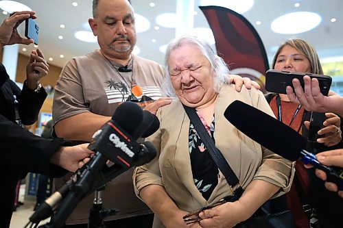 Ruth Bonneville / Free Press 
LOCAL - 60's scoop airport reunion 
Photo of Jonathan Hooker with his biological mom. Patsy George getting emotional as they speak to the media  after they met for the1st time after many years at the airport Wednesday. 
Jonathan Hooker, who was taken from his family in Northern Manitoba in the 1970s, arrives with his wife Charmaine Hooker (green vest) after travelling from their home in New Zealand to meet his biological mom, Patsy George and family at the  James Richardson Winnipeg International Airport Wednesday. 
Story info: He’s one of an estimated 30,000 Indigenous children taken from their homes during what has become known as the Sixties Scoop.  A time period that spanned from 1951-1991. Jonathan was adopted by a white middle-class family in Manitoba, and they moved to New Zealand.  
A big welcome party took place with Drummers and Indigenous leaders, family and friends  to celebrate his return home.    His birth mom, Patsy George with her sister, Flora McNabb (grey sweater), granddaughter Nellie McNabb (rust shirt) and many other family members and friends gather at the airport.
Aug 27th,  2025