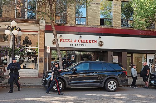 27082025
Brandon Police Service members responded to a gun allegedly being fired in an apartment building on Rosser Avenue between 9th Street and 10th Street in Brandon on Wednesday morning. As of current reporting, no one was injured. (Tim Smith/The Brandon Sun)