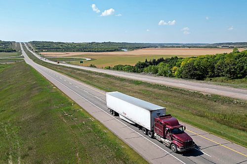 27082025
A semi trailer makes its way east along the Trans Canada Highway west of Brandon on Wednesday. (Tim Smith/The Brandon Sun)