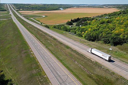 27082025
A semi trailer makes its way west along the Trans Canada Highway west of Brandon on Wednesday. (Tim Smith/The Brandon Sun)