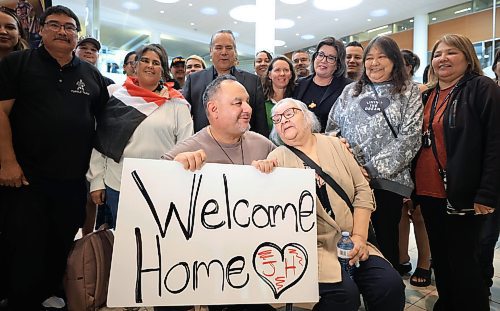 Ruth Bonneville / Free Press
LOCAL - 60's scoop airport reunion
Photo of Jonathan Hooker with his biological mom. Patsy George, having a group shot taken with family and friends after they met for the1st time after many years at the airport Wednesday.
Jonathan Hooker, who was taken from his family in Northern Manitoba in the 1970s, arrives with his wife Charmaine Hooker (green vest) after travelling from their home in New Zealand to meet his biological mom, Patsy George and family at the James Richardson Winnipeg International Airport Wednesday.
Story info: He’s one of an estimated 30,000 Indigenous children taken from their homes during what has become known as the Sixties Scoop. A time period that spanned from 1951-1991. Jonathan was adopted by a white middle-class family in Manitoba, and they moved to New Zealand.
A big welcome party took place with Drummers and Indigenous leaders, family and friends to celebrate his return home. His birth mom, Patsy George with her sister, Flora McNabb (grey sweater), granddaughter Nellie McNabb (rust shirt) and many other family members and friends gather at the airport.
Aug 27th, 2025