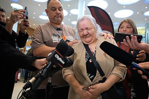 Ruth Bonneville / Free Press
LOCAL - 60's scoop airport reunion
Photo of Jonathan Hooker with his biological mom. Patsy George getting emotional as they speak to the media after they met for the1st time after many years at the airport Wednesday.
Jonathan Hooker, who was taken from his family in Northern Manitoba in the 1970s, arrives with his wife Charmaine Hooker (green vest) after travelling from their home in New Zealand to meet his biological mom, Patsy George and family at the James Richardson Winnipeg International Airport Wednesday.
Story info: He’s one of an estimated 30,000 Indigenous children taken from their homes during what has become known as the Sixties Scoop. A time period that spanned from 1951-1991. Jonathan was adopted by a white middle-class family in Manitoba, and they moved to New Zealand.
A big welcome party took place with Drummers and Indigenous leaders, family and friends to celebrate his return home. His birth mom, Patsy George with her sister, Flora McNabb (grey sweater), granddaughter Nellie McNabb (rust shirt) and many other family members and friends gather at the airport.
Aug 27th, 2025