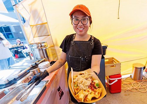 MIKE DEAL / FREE PRESS
Hannah Nguyen and Alain Pham at their station, Toasty Alley, a two-month old operation that sells croffles - a cross between croissants and waffles. The dish was created around 2018 in Korea, and has since spread around the world. Hannah and Alain (married) offer different flavours, including s'mores, pistachio and bacon-and-onions.
Reporter: Dave Sanderson
250828 - Thursday, August 28, 2025.