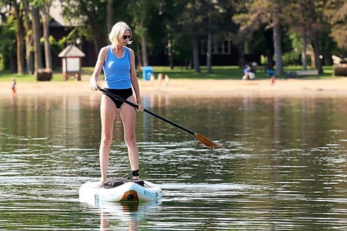 28082025
Kristin Los paddleboards on Clear Lake in Riding Mountain National Park on a hot and sunny Thursday afternoon. 
(Tim Smith/The Brandon Sun)
