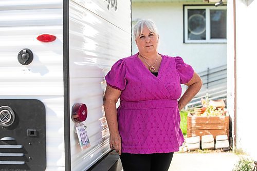 MIKAELA MACKENZIE / FREE PRESS

Sherryll Stenberg, whose camper licence plate was stolen in late June (and has since been reported and replaced), with the plate on Thursday, Aug. 28, 2025. 

For Chris story.
Free Press 2025