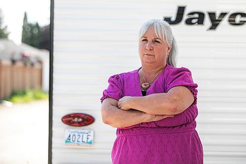 MIKAELA MACKENZIE / FREE PRESS

Sherryll Stenberg, whose camper licence plate was stolen in late June (and has since been reported and replaced), with the plate on Thursday, Aug. 28, 2025. 

For Chris story.
Free Press 2025