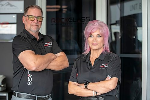 BROOK JONES/FREE PRESS
CearSecure Manufacturing &amp; Distribution is best known for RockGlass, a window security system through impact-resistant windows and doors. The local company is located in CentrePort Canada at 8-3149 Red Fife Rd. in the RM of Rosser, Man. ClearSecure President Colleen Munro (right) and ClearSecure Vice-President Vince Croker are pictured in front of one of their impact-resistant doors and windows at their manufacturing and distribution plant on Tuesday, Aug. 19, 2025.