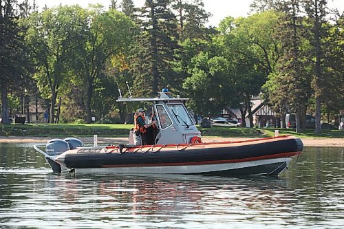 28082025
A parks Canada boat sails near the beach at Clear Lake in Riding Mountain National Park on Thursday.
(Tim Smith/The Brandon Sun)