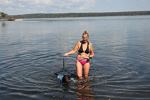 28082025
Cynthia Lovering takes her dog Tucker for a swim in Clear Lake in Riding Mountain National Park on Thursday.
(Tim Smith/The Brandon Sun)
