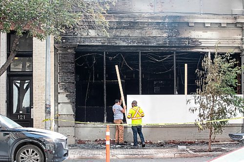 MIKAELA MACKENZIE / FREE PRESS
The Exchange Event Centre gets boarded up after a fire on Friday, Aug. 29, 2025.
For Nicole story.
Free Press 2025