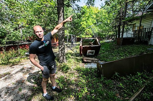 MIKAELA MACKENZIE / FREE PRESS
Paul Taylor on the property he manages for his mother, which has had chronic squatter and vandalism issues, on Friday, Aug. 29, 2025. He plans to demolish the two houses on the property and clear swaths of trees to prevent future issues.
For Chris story.
Free Press 2025