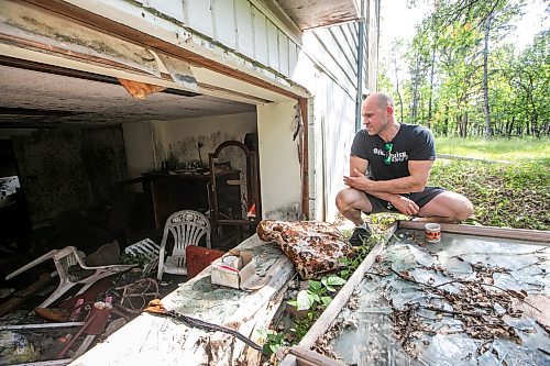 MIKAELA MACKENZIE / FREE PRESS
Paul Taylor on the property he manages for his mother, which has had chronic squatter and vandalism issues, on Friday, Aug. 29, 2025. He plans to demolish the two houses on the property and clear swaths of trees to prevent future issues.
For Chris story.
Free Press 2025
