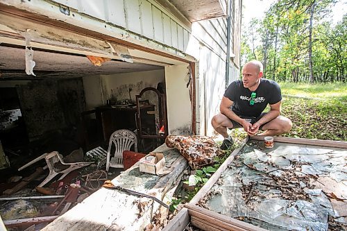 MIKAELA MACKENZIE / FREE PRESS
Paul Taylor on the property he manages for his mother, which has had chronic squatter and vandalism issues, on Friday, Aug. 29, 2025. He plans to demolish the two houses on the property and clear swaths of trees to prevent future issues.
For Chris story.
Free Press 2025