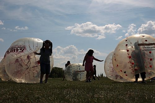 29082025
Kids play in bubble balls during a family wellness day full of games, activities, food and entertainment at Sioux Valley Dakota Nation on a hot Friday. Sioux Valley invited evacuees displaced by fires up north to take part in the day at the First Nation west of Brandon.
Tim Smith/The Brandon Sun)