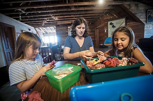 JOHN WOODS / FREE PRESS
Sarah Watkins, executive director of the Dalnavert Museum helps her daughter Gemma, left, and Saege Fowler-Woods with some craft making in the attic of the museum during Dalnavert Days Sunday, August 31, 2025. The museum celebrates the 130th anniversary of the building of the house.
Reporter: standup