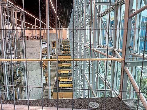 MIKE DEAL / FREE PRESS
The Millennium library’s fourth floor reopened Tuesday with additional safety measures including a portable metal fence keeping people away from the railing, following a suicide earlier this month.
Reporter: Nicole Buffie
250902 - Tuesday, September 02, 2025.