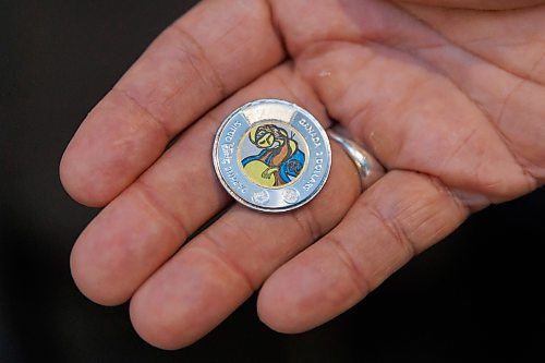 MIKE DEAL / FREE PRESS
Stan Somerville, son of artist Daphne Odjig, holds one of the coins.
The Royal Canadian Mint unveils a special two-dollar circulation coin recognizing artist, Daphne Odjig, and her contributions to the transformation of Indigenous art at a ceremony inside the Manitoba Museum in front of a mural she painted in 1972 titled, The Creation of the World.
250904 - Thursday, September 04, 2025.