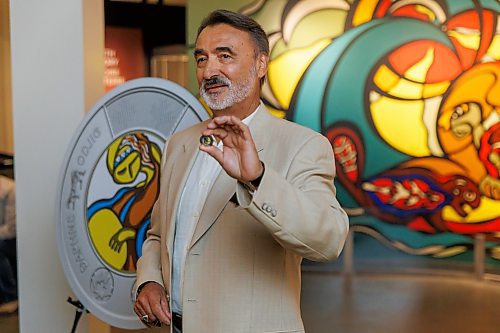 MIKE DEAL / FREE PRESS
Stan Somerville, son of artist Daphne Odjig, holds one of the coins.
The Royal Canadian Mint unveils a special two-dollar circulation coin recognizing artist, Daphne Odjig, and her contributions to the transformation of Indigenous art at a ceremony inside the Manitoba Museum in front of a mural she painted in 1972 titled, The Creation of the World.
250904 - Thursday, September 04, 2025.