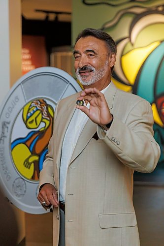 MIKE DEAL / FREE PRESS
Stan Somerville, son of artist Daphne Odjig, holds one of the coins.
The Royal Canadian Mint unveils a special two-dollar circulation coin recognizing artist, Daphne Odjig, and her contributions to the transformation of Indigenous art at a ceremony inside the Manitoba Museum in front of a mural she painted in 1972 titled, The Creation of the World.
250904 - Thursday, September 04, 2025.