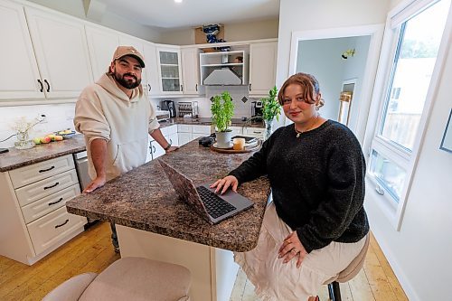 MIKE DEAL / FREE PRESS
Blaise Lepine (left), head of social media and sales and Bailey Hurtig (right), head of operations, working at the counter in the kitchen.
Maddie Thompson, founder of MAD Social, a full-service digital marketing agency.
Staff members work remotely but do occasional &quot;work days&quot; at Thompson&#039;s house.
Reporter: Aaron Epp
250903 - Wednesday, September 03, 2025.