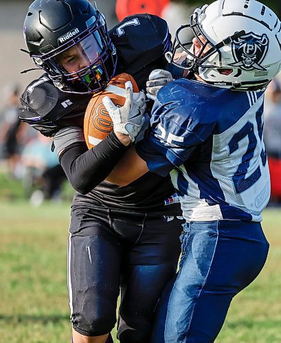 JOHN WOODS / FREE PRESS
Windsor Park Collegiate Royals’ Elliot Aguilar (7) gets tackled by Grant Park Pirates’ Landon Napora (25) in their JV9 game at Falcons Football Club field Tuesday, September 9, 2025. This is the first game for Windsor Park’s new team.
Reporter: josh