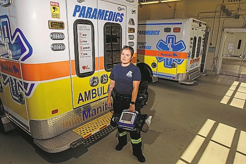 Rebecca Clifton, paramedic and administrative director of the Paramedic Association of Manitoba, stands in front of an ambulance at the Selkirk Regional Health Centre. (The Brandon Sun files)