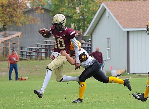 Crocus Plainsmen quarterback Joe Makori scrambles against the Steinbach Sabres during their Winnipeg High School Football League AAAA Tier 1 game at Crocus on Thursday afternoon. (Thomas Friesen/The Brandon Sun)