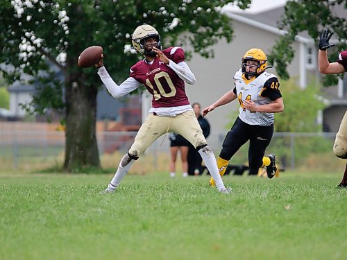 Crocus Plainsmen quarterback Joe Makori looks to throw deep against the Steinbach Sabres during their Winnipeg High School Football League AAAA Tier 1 game at Crocus on Thursday afternoon. (Massimo De Luca-Taronno/The Brandon Sun)