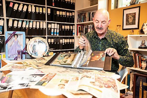 MIKAELA MACKENZIE / FREE PRESS

Hannon Bell with some of his Elizabeth Taylor collection (and articles about his collecting over the years) on Tuesday, Sept. 9, 2025. Behind him on the shelf are over 120 three-ring binders filled with photos and news articles about the actress.

For Dave Sanderson story.
Free Press 2025