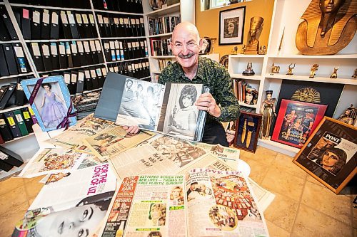 MIKAELA MACKENZIE / FREE PRESS
Hannon Bell with some of his Elizabeth Taylor collection (and articles about his collecting over the years) on Tuesday, Sept. 9, 2025. Behind him on the shelf are over 120 three-ring binders filled with photos and news articles about the actress.
For Dave Sanderson story.
Free Press 2025