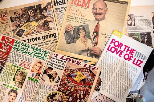 MIKAELA MACKENZIE / FREE PRESS
Articles about Hannon Bellճ Elizabeth Taylor collection over the years on Tuesday, Sept. 9, 2025. Behind him on the shelf are over 120 three-ring binders filled with photos and news articles about the actress.
For Dave Sanderson story.
Free Press 2025