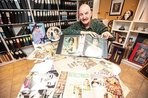 MIKAELA MACKENZIE / FREE PRESS
Hannon Bell with some of his Elizabeth Taylor collection (and articles about his collecting over the years) on Tuesday, Sept. 9, 2025. Behind him on the shelf are over 120 three-ring binders filled with photos and news articles about the actress.
For Dave Sanderson story.
Free Press 2025