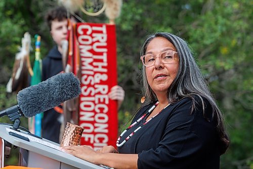 MIKE DEAL / FREE PRESS
Stephanie Scott, executive director, National Centre for Truth and Reconciliation, speaks during the event.
Premier Wab Kinew, minister responsible for Indigenous reconciliation, announces that his government will be putting forward $20 million to support the construction of a permanent home for the National Centre for Truth and Reconciliation (NCTR) at the University of Manitoba during a ceremony Friday afternoon where he also accepted a gift to the province from the NCTR, a bronze sculpture that depicts a single feather made by artist, Wayne Stranger, who is from Peguis First Nation.
Reporter: Niigaan Sinclair and Scott Billeck
250912 - Friday, September 12, 2025.
