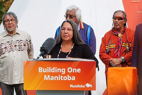 MIKE DEAL / FREE PRESS
Stephanie Scott, executive director, National Centre for Truth and Reconciliation, speaks during the event.
Premier Wab Kinew, minister responsible for Indigenous reconciliation, announces that his government will be putting forward $20 million to support the construction of a permanent home for the National Centre for Truth and Reconciliation (NCTR) at the University of Manitoba during a ceremony Friday afternoon where he also accepted a gift to the province from the NCTR, a bronze sculpture that depicts a single feather made by artist, Wayne Stranger, who is from Peguis First Nation.
Reporter: Niigaan Sinclair and Scott Billeck
250912 - Friday, September 12, 2025.