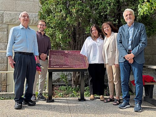 JOHN LONGHURST / FREE PRESS
Jewish Heritage Centre of Western Canada program and events committee chairman Daniel Stone (from left), centre president Harlan Abells, Asper Jewish Community Campus board president Jill Winograd, centre executive director Belle Jarniewski and centre staff member Stan Carbonne after a plaque honouring Rabbi Israel Isaac Kahanovitch was unveiled Sunday.