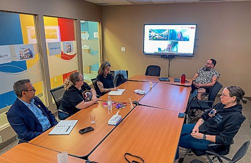 MIKE DEAL / FREE PRESS
(Clockwise from left) Jarred Baker, senior advisor on homelessness for City of Winnipeg, Lorie English, executive director, West Central Women&#039;s Resource Centre, Cindy with Main Street Project, via video link, Kate Sjoberg, Executive Director, Resource Assistance for Youth Inc. and Tessa Blaikie Whitecloud, the premier&#x2019;s senior advisor on ending chronic homelessness, Jamil Mahmood, executive director of Main Street Project, and Karen Murisonwith Main Street Project during a meeting with homelessness groups involved in the Your Way Home Strategy in the boardroom at Main Street Project Tuesday afternoon.
Reporter: Scott Billeck 
250916 - Tuesday, September 16, 2025.