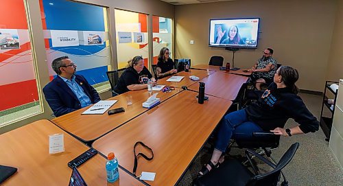 MIKE DEAL / FREE PRESS
(Clockwise from left) Jarred Baker, senior advisor on homelessness for City of Winnipeg, Lorie English, executive director, West Central Women&#039;s Resource Centre, Cindy with Main Street Project, via video link, Kate Sjoberg, Executive Director, Resource Assistance for Youth Inc., Jamil Mahmood, executive director of Main Street Project, and Karen Murisonwith Main Street Project during a meeting with homelessness groups involved in the Your Way Home Strategy in the boardroom at Main Street Project Tuesday afternoon.
Reporter: Scott Billeck 
250916 - Tuesday, September 16, 2025.
