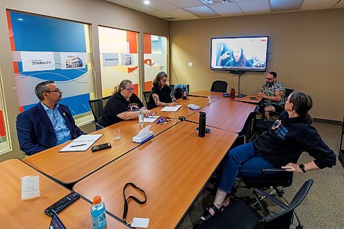 MIKE DEAL / FREE PRESS
(Clockwise from left) Jarred Baker, senior advisor on homelessness for City of Winnipeg, Lorie English, executive director, West Central Women&#039;s Resource Centre, Cindy with Main Street Project, via video link, Kate Sjoberg, Executive Director, Resource Assistance for Youth Inc., Jamil Mahmood, executive director of Main Street Project, and Karen Murisonwith Main Street Project during a meeting with homelessness groups involved in the Your Way Home Strategy in the boardroom at Main Street Project Tuesday afternoon.
Reporter: Scott Billeck 
250916 - Tuesday, September 16, 2025.