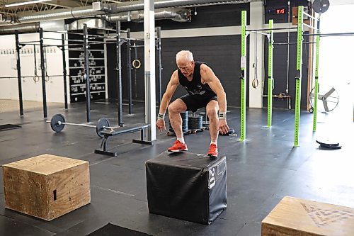 Murray works through a set of box jumps during a training class on Tuesday. (Tim Smith/The Brandon Sun)