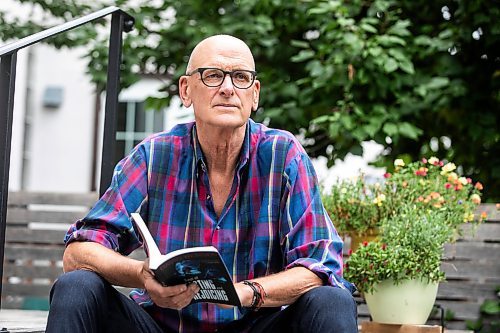 MIKAELA MACKENZIE / FREE PRESS

David Bergen and his new book, Days of Feasting and Rejoicing, on Wednesday, Sept. 17, 2025. 

For Ben Sigurdson story.
Free Press 2025