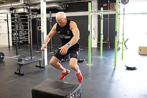 17092025
Doug Murray works through a set of box jumps during a training class at Rocked Community Fitness in Brandon on Tuesday. 
  (Tim Smith/The Brandon Sun)
