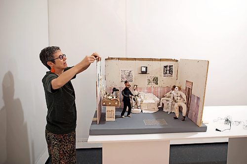 17092025
Artist Diana Thorneycroft assembles her art piece titled Coffee Break at the Sanatorium on Wednesday in advance of the public reception for three exhibitions including 8 Rooms, featuring the work of Thorneycroft and other artists, at the Art Gallery of Southwestern Manitoba. 8 Rooms features eight dioramas created by a collective of eight artists to be used in Anita Lebeau&#x2019;s 11-minute animated film 8 Rooms. The public reception for 8 Rooms, Ancestral Aviators and I couldn&#x2019;t have done it without you runs from 7:00PM-10:00PM tonight at the AGSM. 
  (Tim Smith/The Brandon Sun)