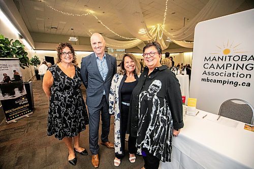 MIKAELA MACKENZIE / FREE PRESS

Kim Scherger, exective director of the Manitoba Camping Association (left), Paul Samyn, Free Press editor-in-chief, and storytellers Angela Recio de Garcia and Bonnie Robinson at the Sunshine Fund Donor Appreciation Luncheon at the Caboto Centre on Thursday, Sept. 18, 2025.

For &#x460;story.
Free Press 2025