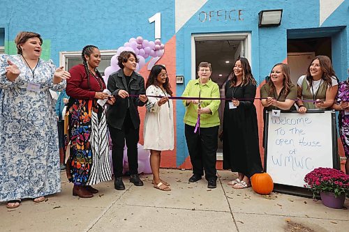 18092025
Terry Deller, one of the founding members of the Western Manitoba Women&#039;s Centre, is surrounded by staff, while cutting the ribbon during the grand opening of the centre&#x2019;s new location in the 1200 block of Rosser Avenue on Thursday. 
(Tim Smith/The Brandon Sun)
