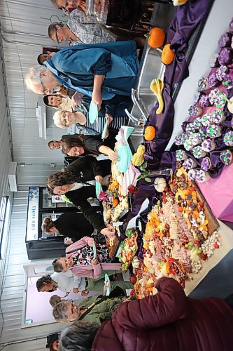 18092025
Guests attending the opening of the Western Manitoba Women&#039;s Centre&#x2019;s new location in the 1200 block of Rosser Avenue on Thursday enjoy snacks and treats after the ribbon cutting. 
(Tim Smith/The Brandon Sun)
