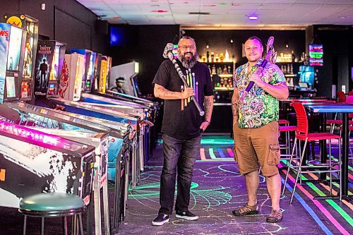 MIKAELA MACKENZIE / FREE PRESS

Raj Maniar (left) and Adam Dudek, owners of Smash n Axe Arcade Disco, on Thursday, Sept. 18, 2025. Smash n Axe is a new business that combines four axe throwing lanes, two rage rooms, numerous arcade games and a bar

For biz story.
Free Press 2025