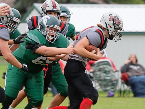 Neelin's Farran Adema (#65) closes in for a tackle during the second quarter against the Outlaws. (Massimo De Luca-Taronno/The Brandon Sun)