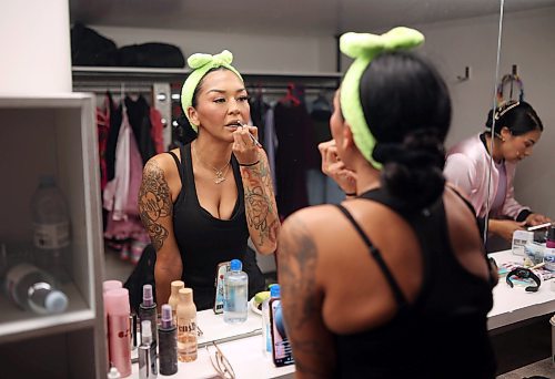 22092025
Nipîy Iskwew, who plays Jan, and Tammy Rae Lamouche, who plays Rezzo, in the musical Bear Grease, prepare in a dressing room below the Aud Theatre in Virden prior to a matinee show for students on Monday afternoon. The indigenous take on the classic 1978 musical Grease opened an eastern Canada tour Sunday evening in Virden with their first performance following a two-month off broadway run in New York City, where it earned the recognition of being the longest indigenous off broadway musical run. The musical heads to Winnipeg and then to Canada’s east coast for a series of performances. Bear Grease had its debut at the Edmonton Fringe Festival in 2021. The Aud Theatre opened in Virden in 1912 and was one of the last opera houses of its kind to be built in Manitoba.
(Tim Smith/The Brandon Sun)