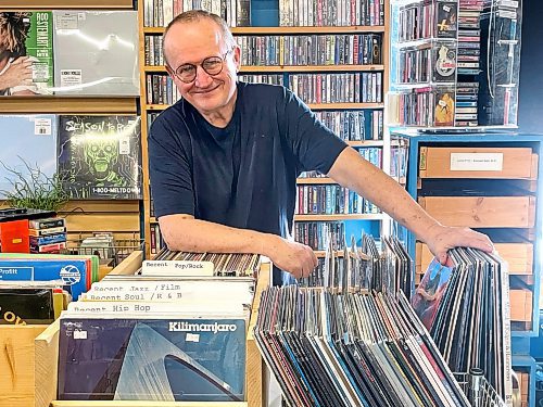 Ruth Bonneville / Free Press
Intersection - Cassettes part 2
Photo of Cavin Borody, of Winnipeg Record & Tape Co.,with a large collection of cassette tapes behind him. See story
This is part two of an Intersection piece on the enduring popularity of audio cassettes. The new Taylor Swift album comes out Oct 3 - it will be available on vinyl, CD and... audio cassette. I talked with a few store owners, about who's buying cassettes nowadays.
Shots of cassette displays at Winnipeg Record & Tape and Cavin at Winnipeg Record & Tape also has an old Walkman he can show off, loaded with a cassette.
Reporter: Dave Sanderson
Sept 24th, 2025